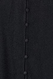 Product shot of the Marie Blouse in colour Black (Black), detail