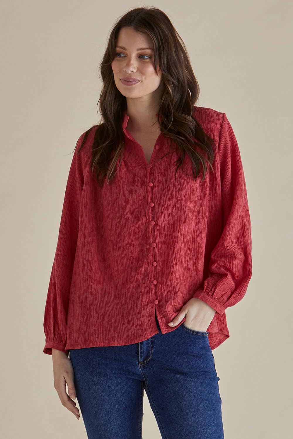 A model wearing the Marie Blouse in colour DustyPink (Pink), from the front, cropped image