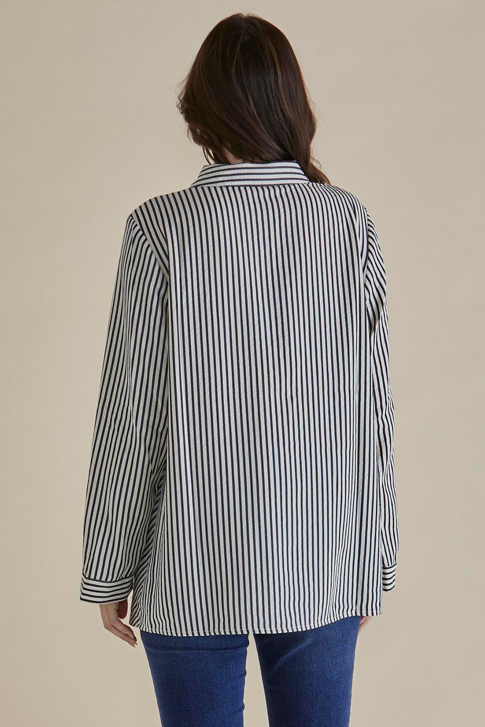 A model wearing the Cotton Blend Crinkle Shirt in colour Blkstripe, from the back
