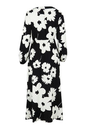 Product shot of the Aries Dress in colour Floral (Black), from the back