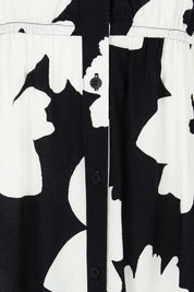 Product shot of the Aries Dress in colour Floral (Black), detail