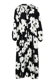 Product shot of the Aries Dress in colour Floral (Black), from the front