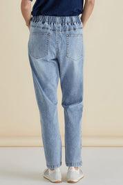 A model wearing the Haven Straight Leg Jean in colour Lightblue (Blue), from the back