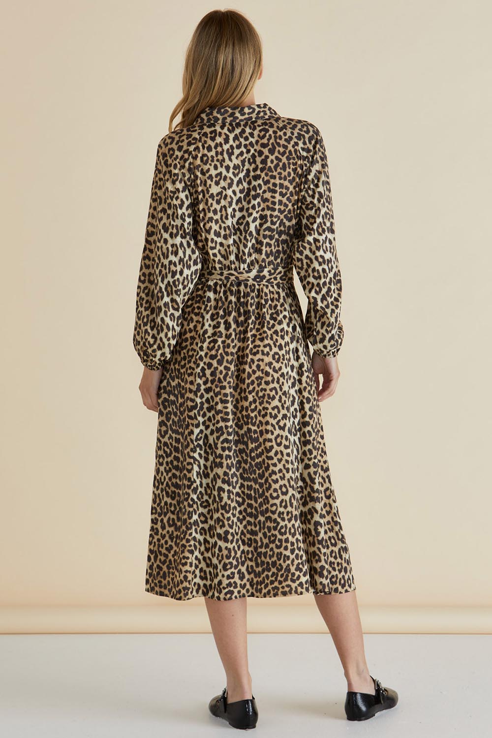 A model wearing the Lisa Leopard Shirt Dress in colour Leopard, from the back
