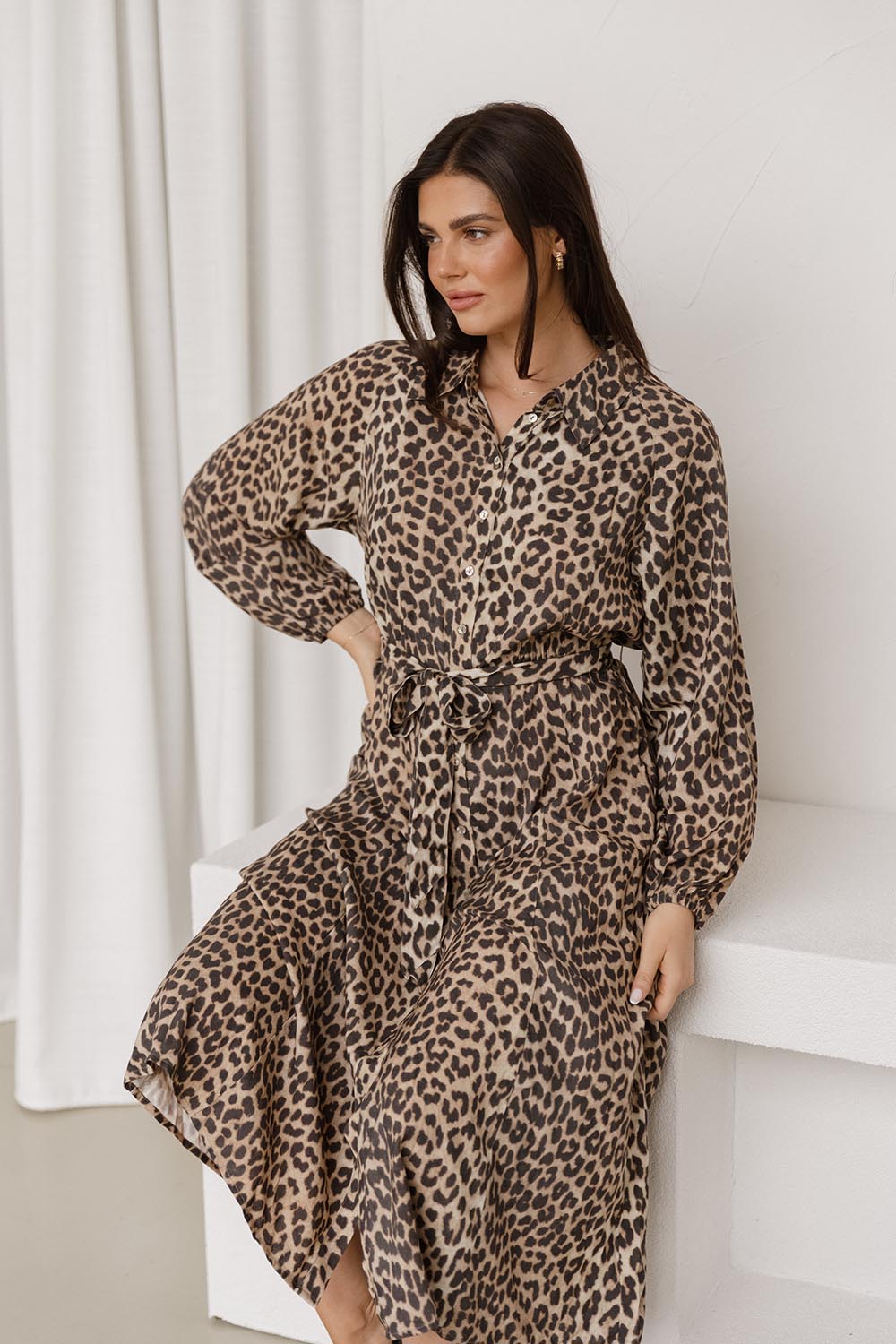 A model wearing the Lisa Leopard Shirt Dress in colour Leopard, from the front, showing the whole outfit
