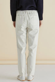 A model wearing the Carey Cotton Blend Chino Jogger in colour Stone, from the back