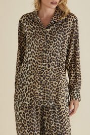 A model wearing the Lexi Shirt in colour Leopard, from the front, cropped image