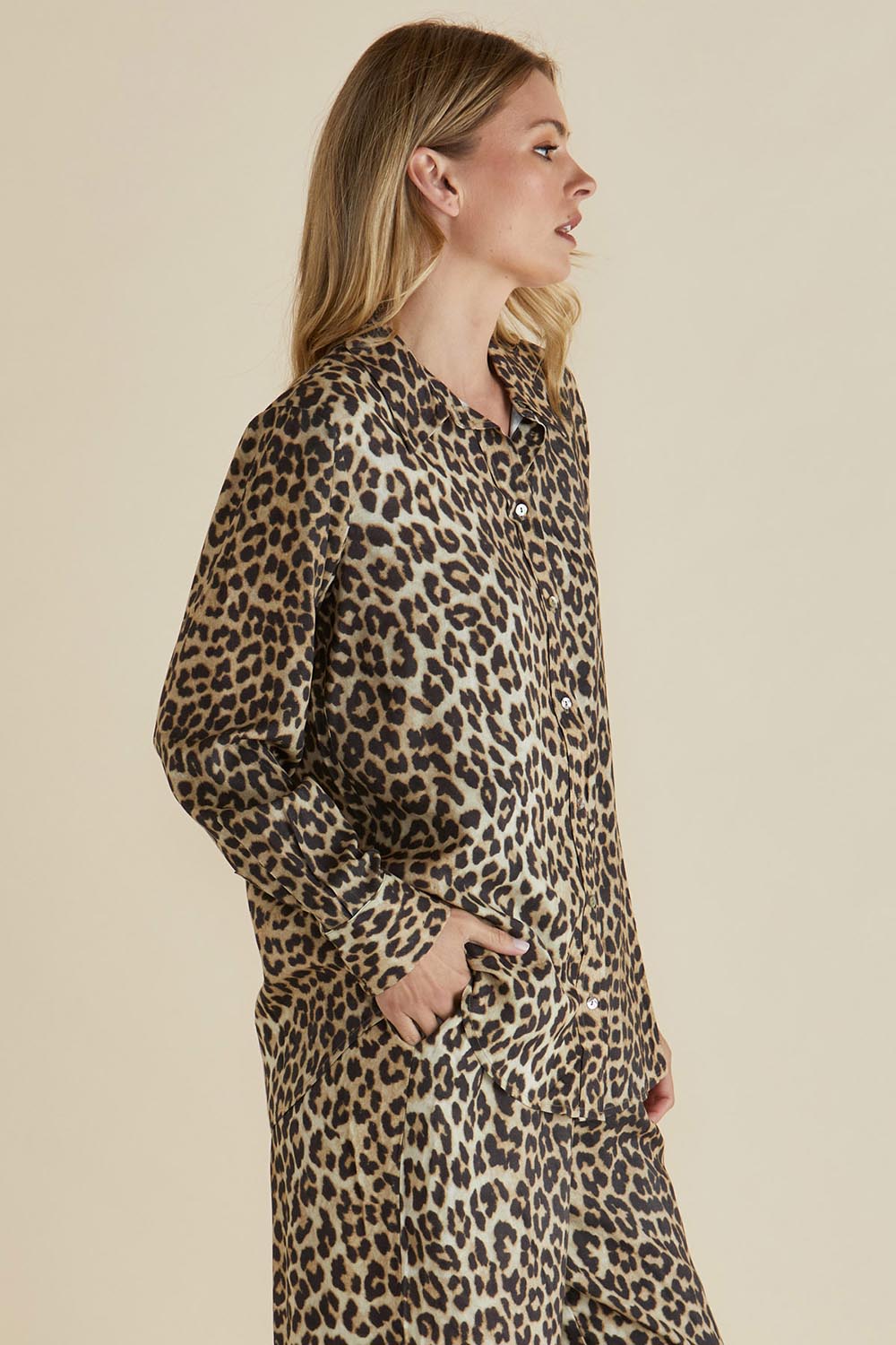 A model wearing the Lexi Shirt in colour Leopard, from the front, cropped image
