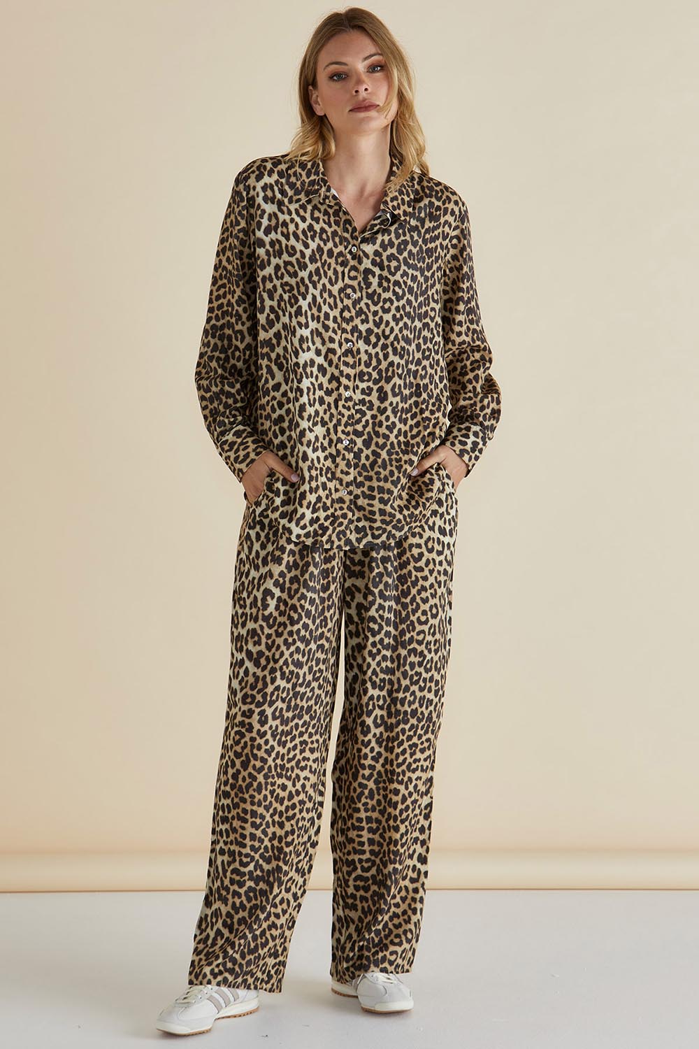 A model wearing the Lexi Shirt in colour Leopard, from the front, showing the whole outfit