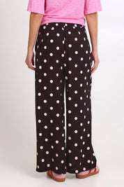 Model Madelinec wearing size 10 of the Zander Pant – Pinkchoc in colour Pinkchoc, from the back