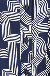 Product shot of the Skye Dress in colour Navygeo (Blue), detail