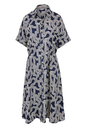Product shot of the Skye Dress in colour Navygeo (Blue), from the front
