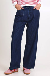 Model Madelinec wearing size 10 of the Goldie Jeans – Darkblue in colour Darkblue, in a cropped view