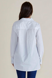A model wearing the Shellie Cotton Poplin Shirt in colour White (White), from the back