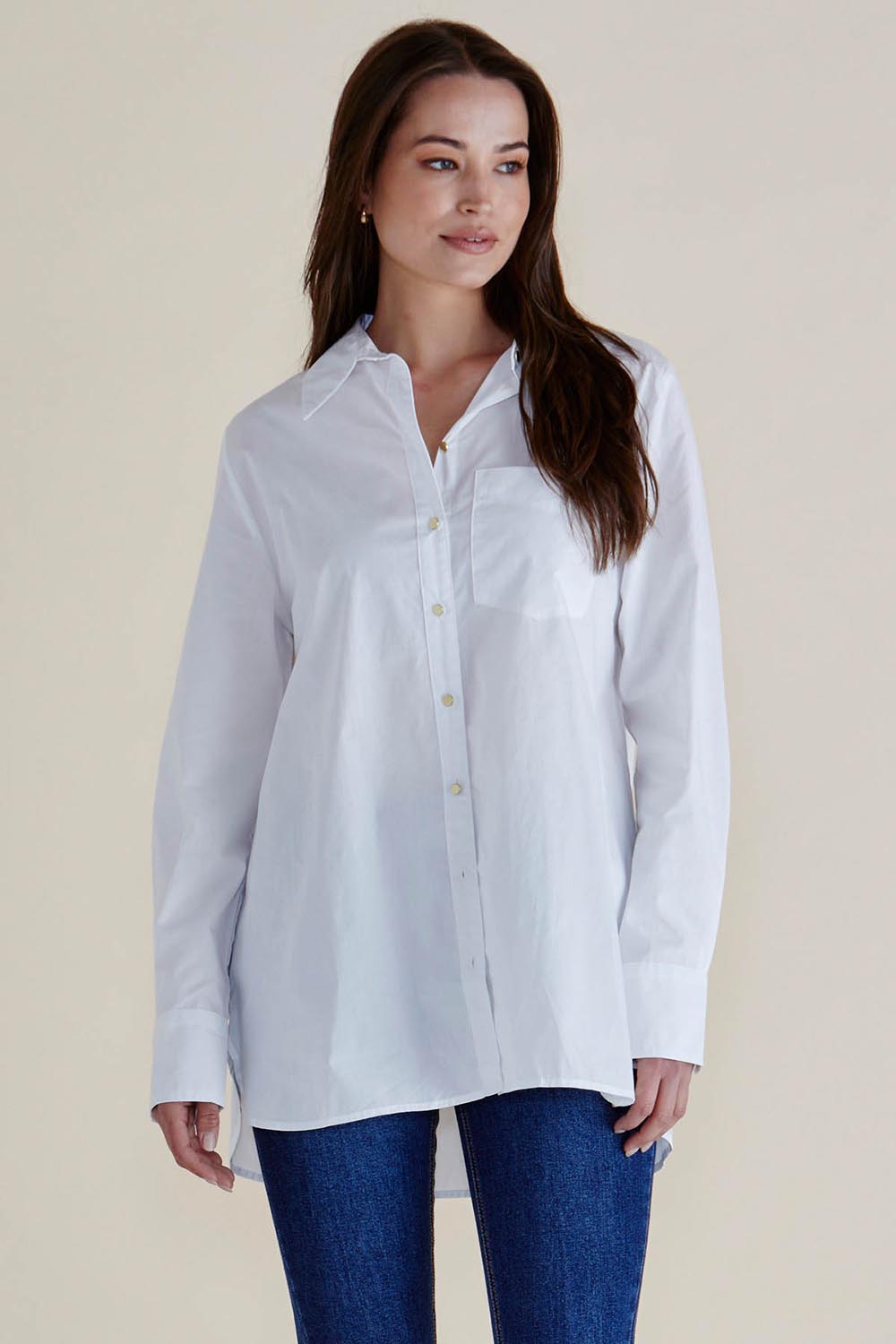 A model wearing the Shellie Cotton Poplin Shirt in colour White (White), from the front, cropped image
