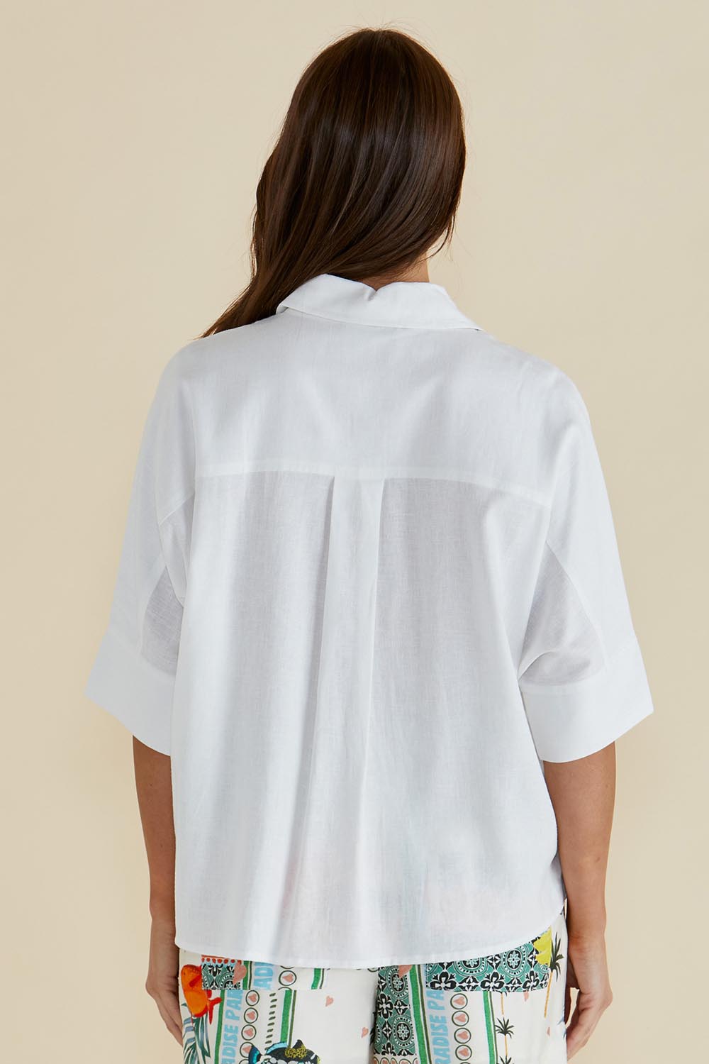 A model wearing the Lynwood Linen Blend Shirt in colour White (White), from the back