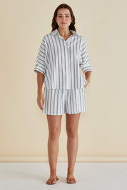 A model wearing the Sierra Short in colour Blkwhite (White), from the front, showing the whole outfit