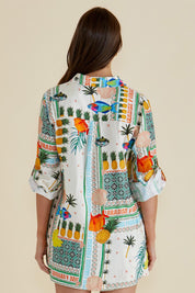A model wearing the Mills Shirt in colour Paradise, from the back