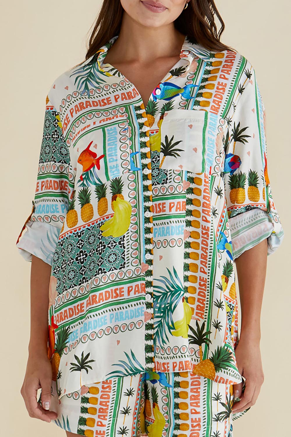 A model wearing the Mills Shirt in colour Paradise, from the front, cropped image