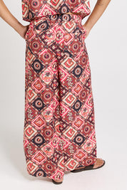 Model Genericm wearing size sample of the Sable Wide Leg Pant – Coco in colour Coco, from an angle
