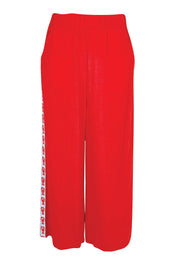 Product shot of the Sable Wide Leg Pant – Red in colour Red, from the front