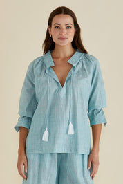 A model wearing the Charli Cotton Blouse in colour Green (Green), from the front, cropped image