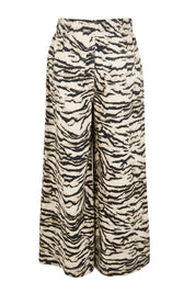 Product shot of the Saffra Relax Leg Jean – Animal in colour Animal, from the back