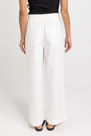 Model Genericm wearing size sample of the Saffra Relax Leg Jean – White in colour White, from the back