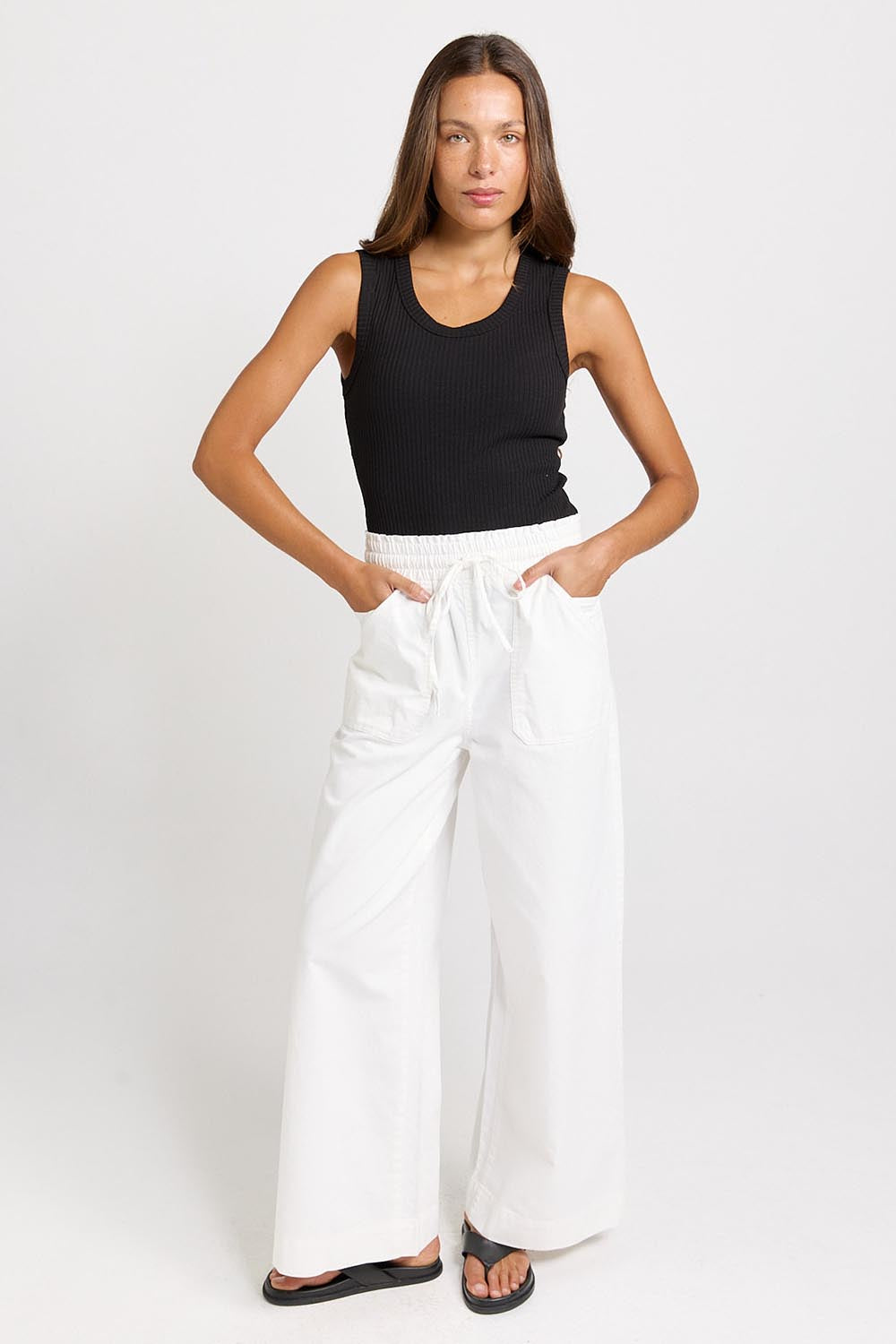 Model Genericm wearing size sample of the Saffra Relax Leg Jean – White in colour White, from the front