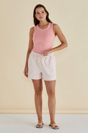 A model wearing the Relax Denim Shorts in colour Pink (Pink), from the front, showing the whole outfit