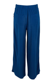 Product shot of the Rio Reef Pant in colour Navy (Blue), from the back