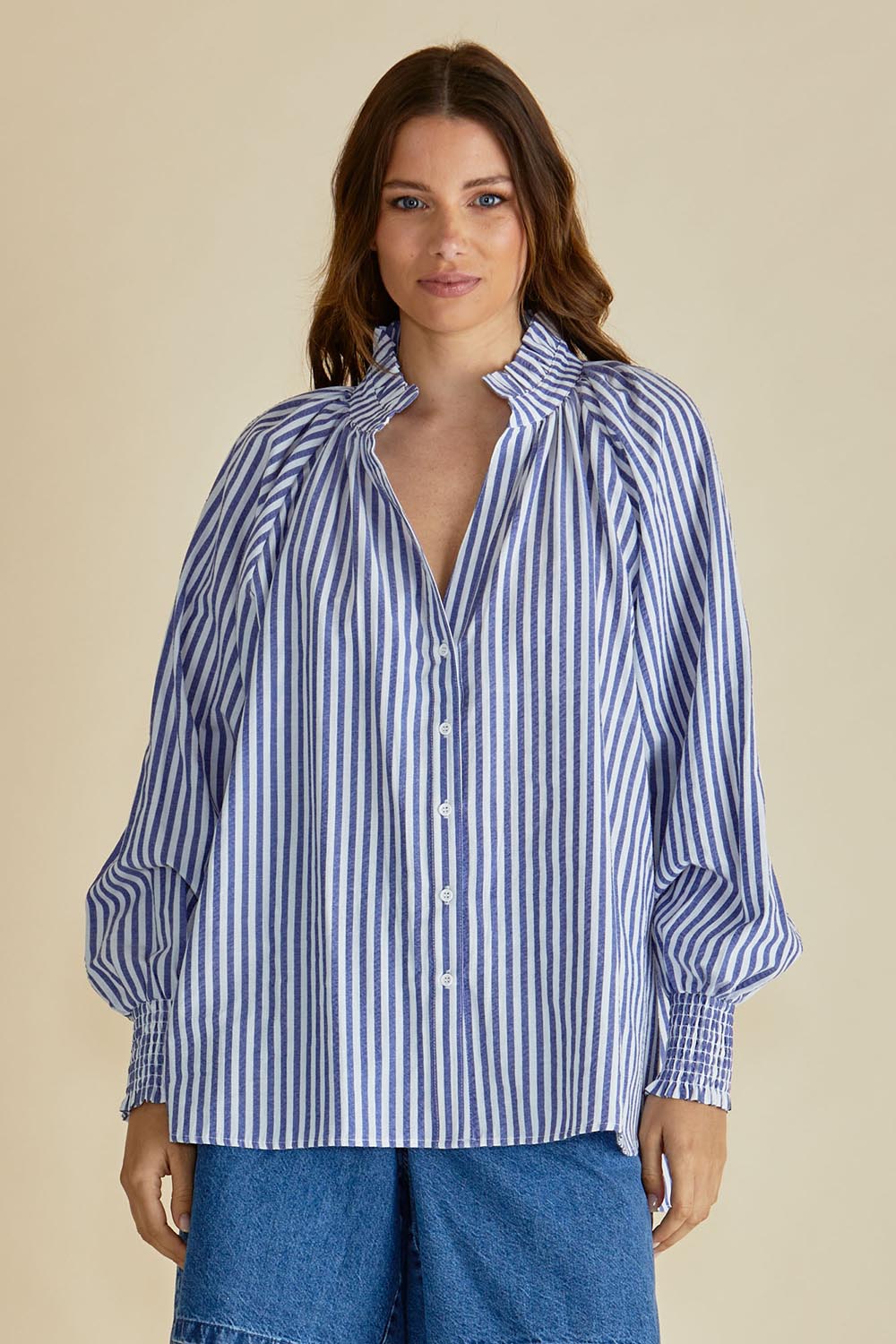 A model wearing the Romi Cotton Blend Shirt in colour Navystripe (Blue), from the front, cropped image