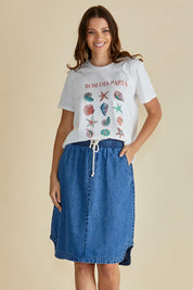 A model wearing the Dara Denim Skirt in colour Blue (Blue), from the front, cropped image