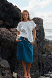 A model wearing the Dara Denim Skirt in colour Blue (Blue), from the front, showing the whole outfit