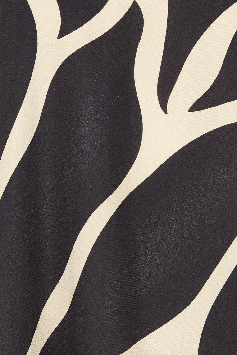Product shot of the Lana Tunic Tank in colour Floral (Black), detail