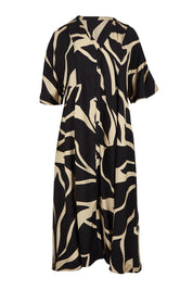 Product shot of the Camille Dress in colour Floral (Black), from the front