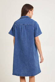 Model Amanda wearing size 16 of the Shift Denim Shirt Dress in colour Dustyblue (Blue), from the back