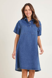 Model Amanda wearing size 16 of the Shift Denim Shirt Dress in colour Dustyblue (Blue), from the front, cropped image