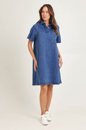 Model Amanda wearing size 16 of the Shift Denim Shirt Dress in colour Dustyblue (Blue), from the front, showing the whole outfit