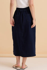 A model wearing the Denim Maxi Jogger Skirt in colour Darkblue (Blue), from the back