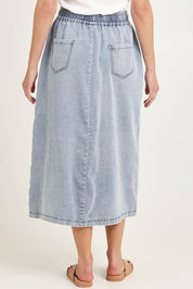 Model Madeline wearing size 10 of the Denim Maxi Jogger Skirt in colour Lightblue (Blue), from the back
