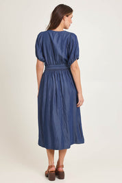 Model Madeline wearing size 10 of the Lee Lyocell Dress in colour Darkblue (Blue), from the back