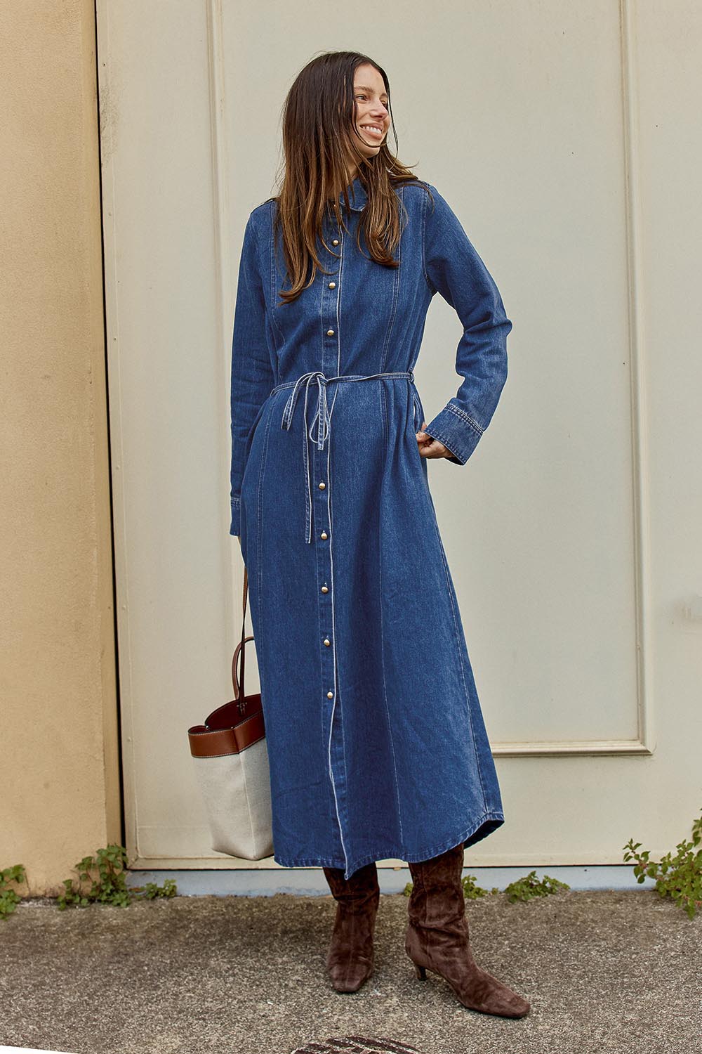Model Genericm wearing size sample of the Nico Denim Dress – Midblue in colour Midblue, from the front