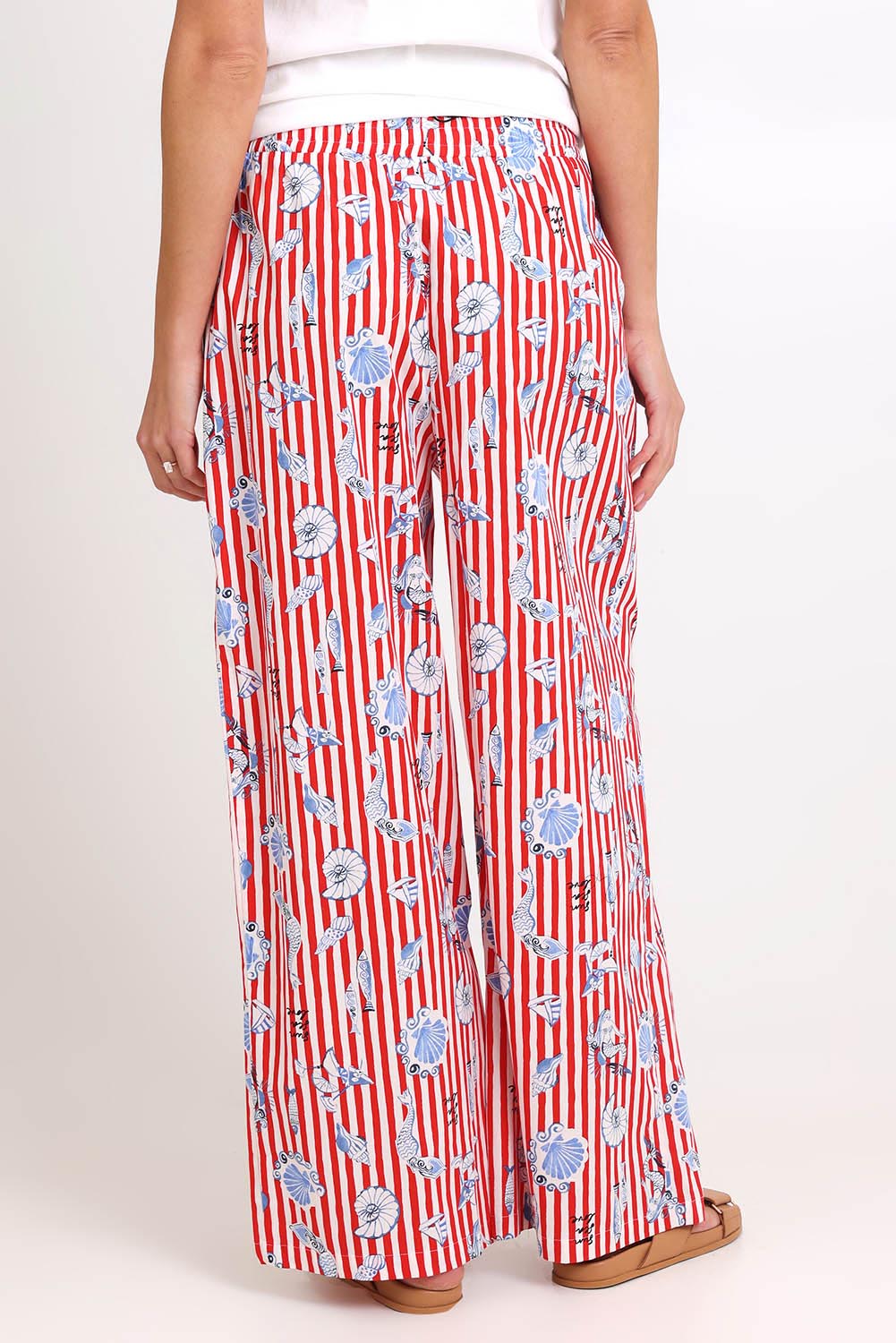 Model Madelinec wearing size 10 of the Amalfi Pant – Amalfi in colour Amalfi, from the back