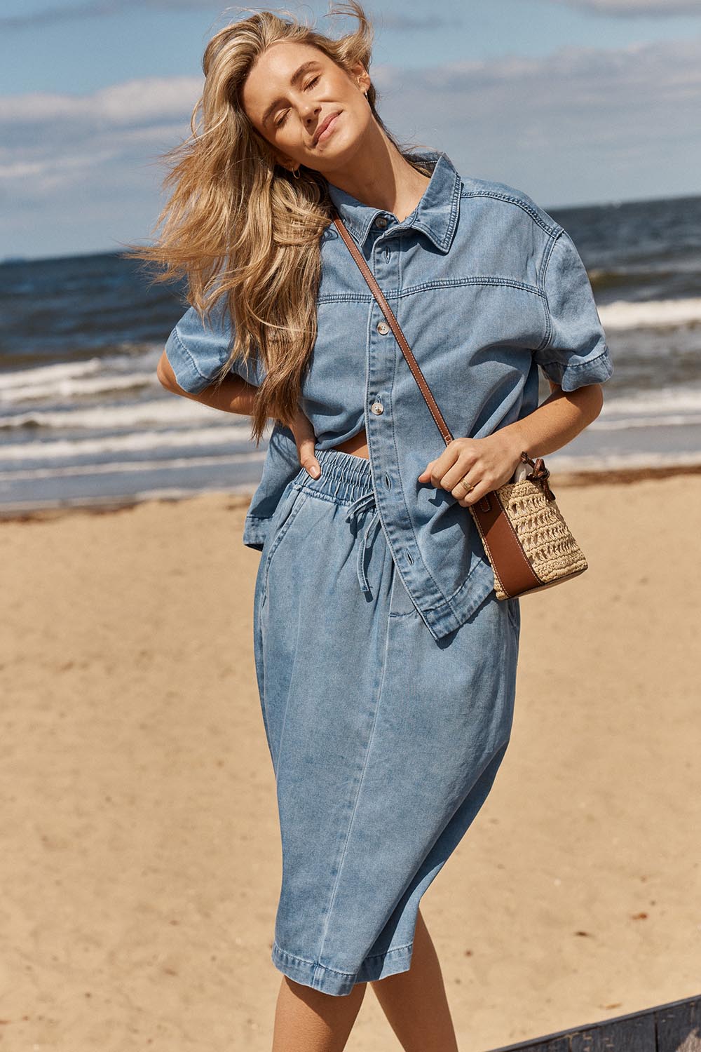 Model Genericm wearing size sample of the Quinn Cotton Skirt – Bluemed in colour Bluemed, in a cropped view