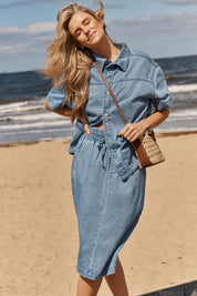 Model Genericm wearing size sample of the Quinn Cotton Skirt – Bluemed in colour Bluemed, in a cropped view