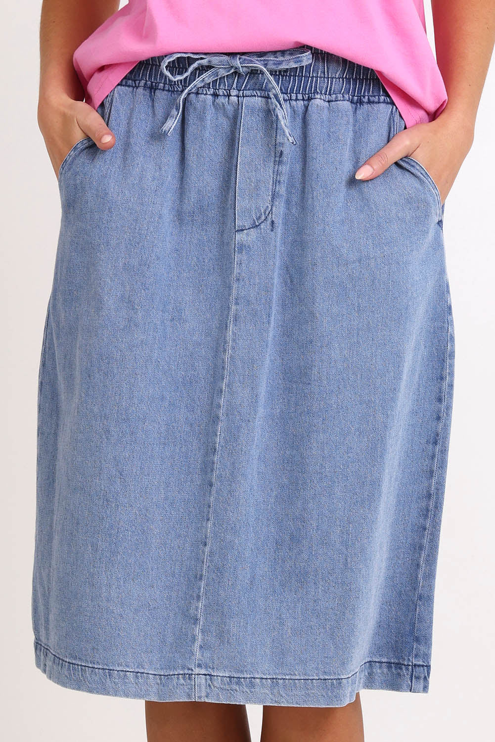 Model Madelinec wearing size 10 of the Quinn Cotton Skirt – Bluemed in colour Bluemed, in a cropped view