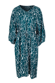 Product shot of the Bella Dress – Teal in colour Teal, from the front