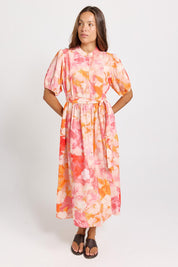Model Genericm wearing size sample of the Nia Dress – Floral in colour Floral, from the front