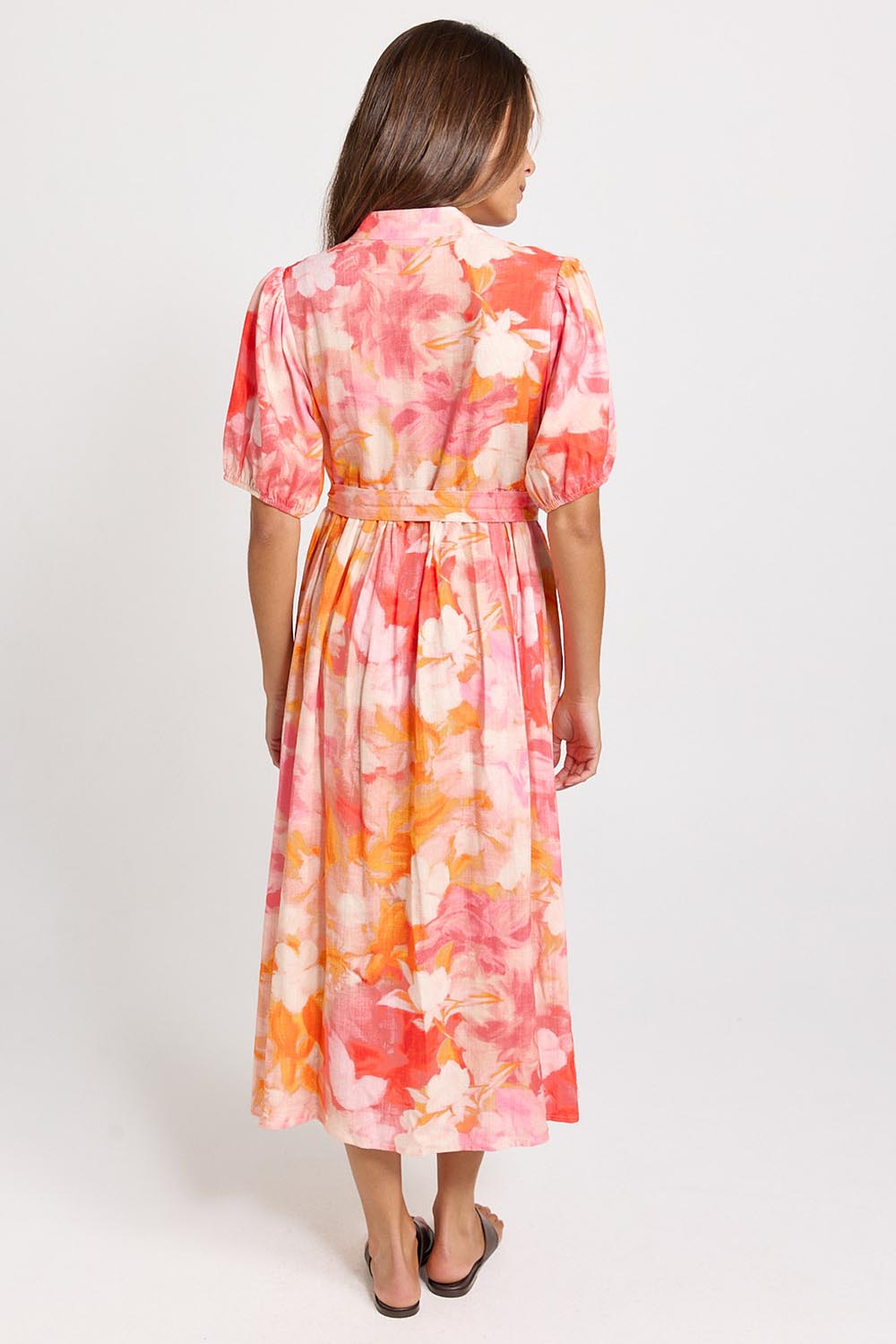 Model Genericm wearing size sample of the Nia Dress – Floral in colour Floral, from the front